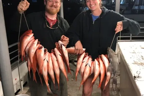 a group of people posing for the camera