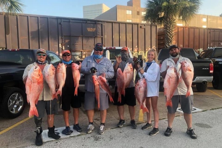 a group of people posing for the camera