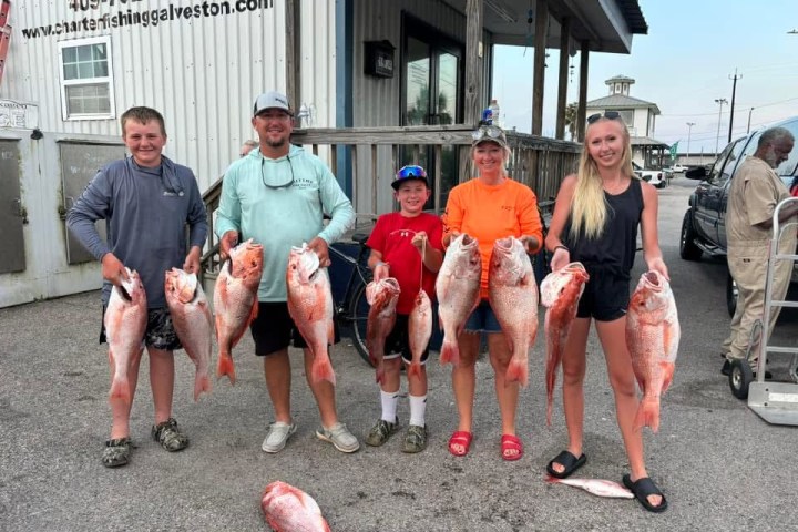 a group of people posing for the camera